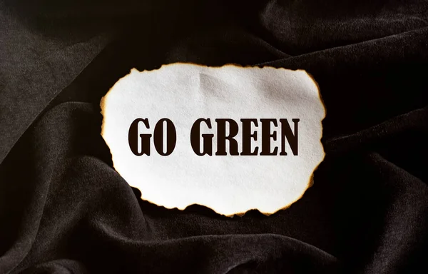 Burnt White Piece Paper Text Green Black Fabric Background — Stock Photo, Image