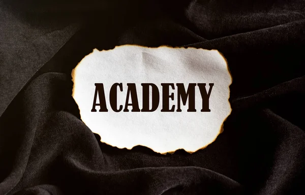 Burnt White Piece Paper Text Academy Black Fabric Background — Stock Photo, Image