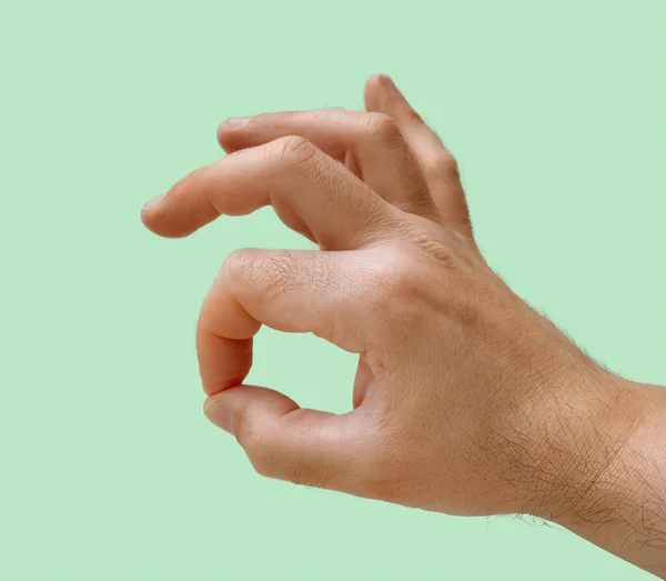 Откройте Руку Большим Указательным Пальцами Касаясь Конца Зеленом Фоне Совершенство — стоковое фото