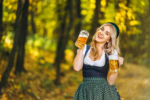 Pretty Happy Blonde Dirndl Traditional Festival Dress Holding Two Mugs — Stock Photo, Image