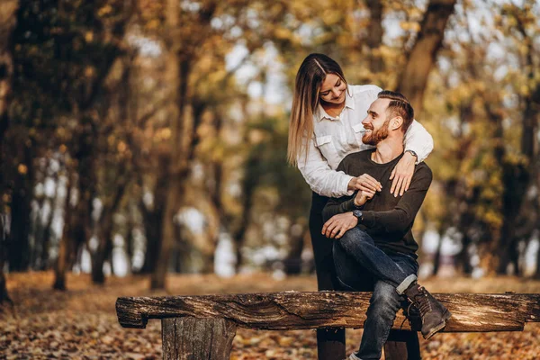 Young Loving Couple Sitting Wooden Bench Forest Man Woman Hugging — Stock Photo, Image