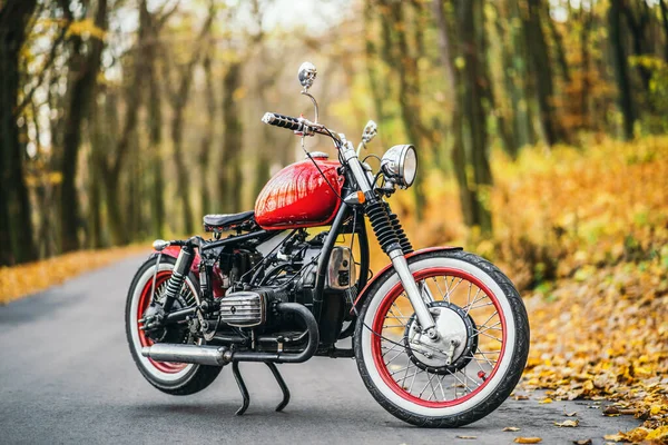 Red Custom Old Fashioned Motorcycle Road Forest Colorful Blurred Background — Stock Photo, Image