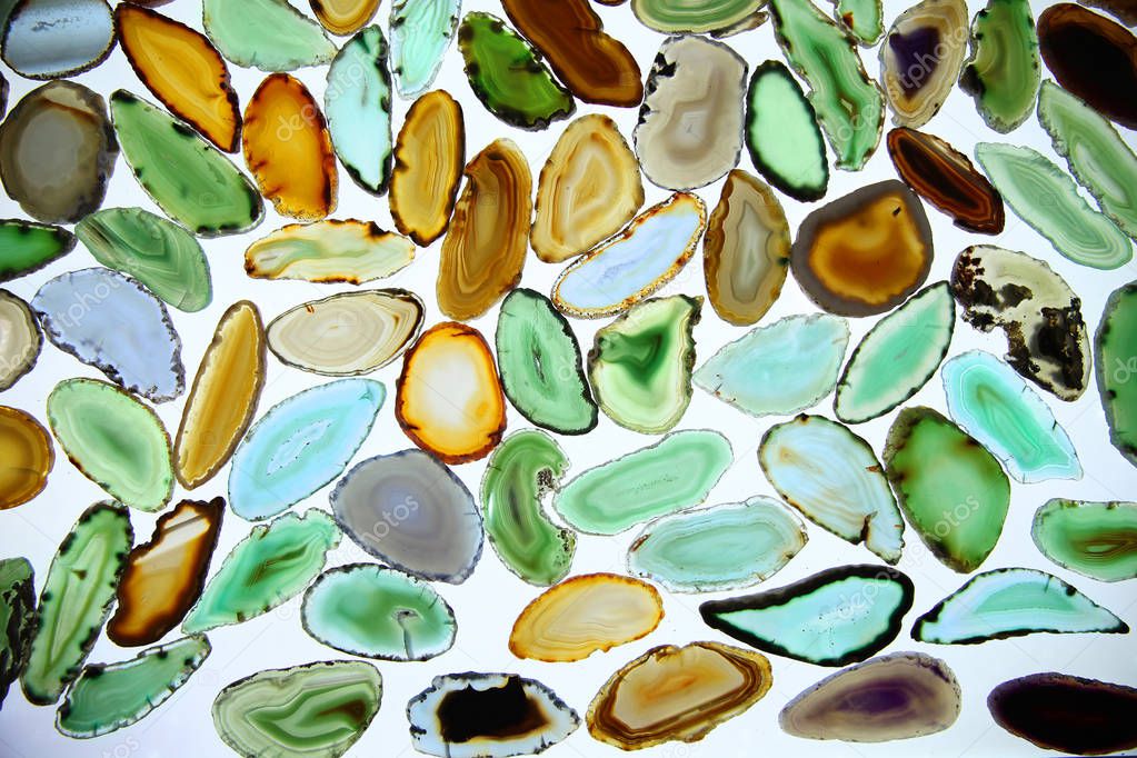 Large number of colored agates, faceted stones for decoration