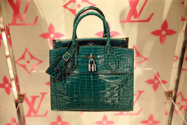 Green women's bag by Louis Vuitton, a new collection in the comp