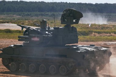 Modern tank at the tank biathlon competition in Alabino near Moscow during the Army-2020 forum clipart