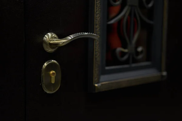 door handle on an iron door