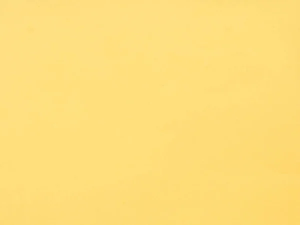 Sarı renkli kağıt doku. Arka plan olarak kullanılabilir