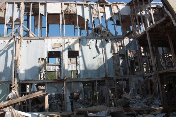 wall of a destroyed house