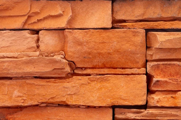 Brick decorative wall in the salt of the apartment close-up