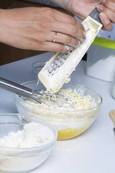 Woman Grinds Butter Adds Dough Next Container Flour Coconut Shaving — Stock Photo, Image