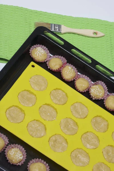 Baking Sheet Silicone Mold Dough Also Small Paper Forms Filled — Stock Photo, Image