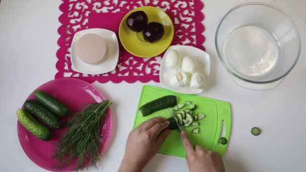 Man Takes Cucumber Plate Starts Cutting Cutting Board Nearby Dishes — Stock Video