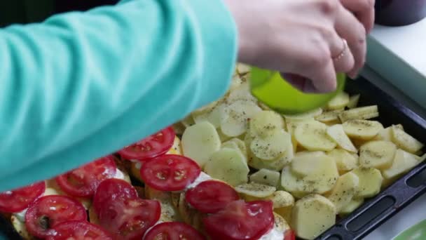 Woman Adds Spices Baking Sheet Baking Tray Laid Layers Potatoes — Stock Video