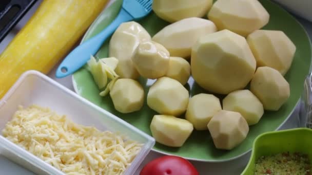Ingredients Cooking Dinner Table Laid Potatoes Zucchini Tomatoes Grated Cheese — Stock Video