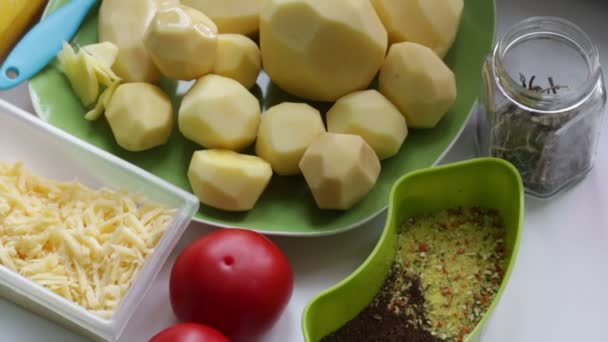 Ingredients Cooking Dinner Table Laid Potatoes Zucchini Tomatoes Grated Cheese — Stock Video