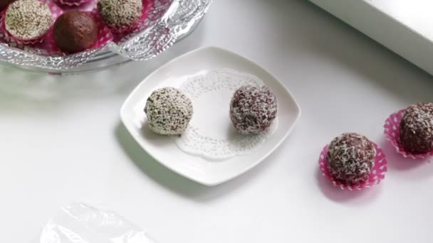 Woman Makes Sweets Cocoa Powder Cookies Sprinkle Sesame Coconut Shavings — Stock Video