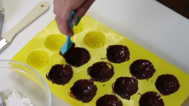 Woman Lubricates Melted Chocolate Silicone Mold Next Table Other Ingredients — Stock Video