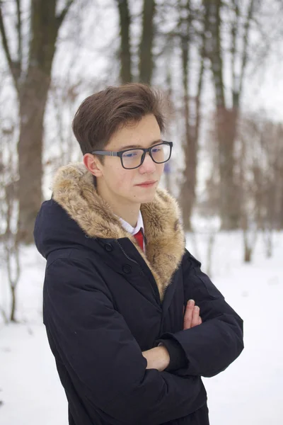 Portrait Young Man Coat Fur Collar Pensive Face Expression Hands — Stock Photo, Image