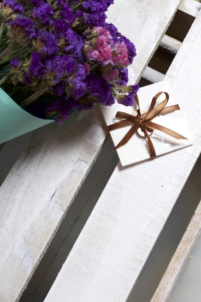 Bouquet Dried Flowers Wrapped Colored Paper Small Greeting Card — Stock Photo, Image