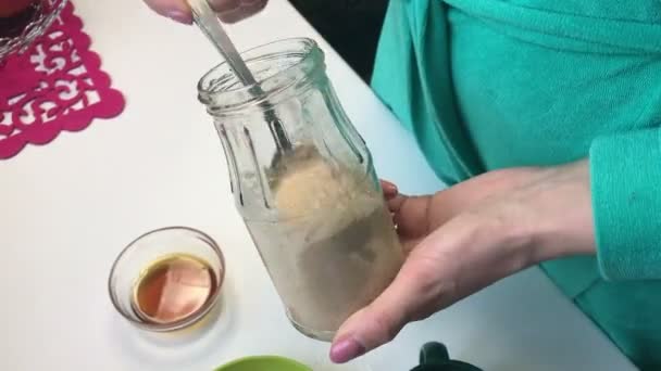 Woman Mixing Flour Liquid Honey Glass Jar Checks Quality Mixture — Stok video