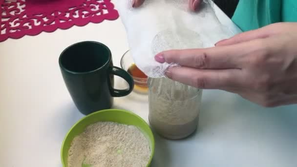 Woman Covers Gauze Jar Mixture Flour Liquid Honey Preparation Yeast — Stock Video