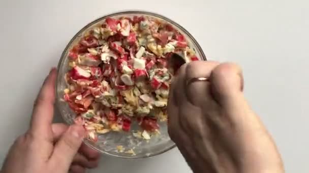 Man Mixing Ingredients Salad Cooking Salad Crab Sticks Cheese Eggs — Stock Video