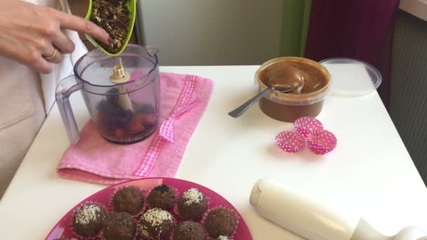 Woman Adds Nuts Blender Grinding Cooking Sweets — Stock Video