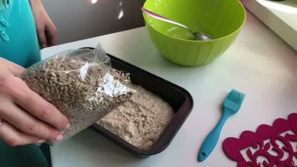 Baking Bread Home Wholemeal Dough Lies Bread Pan Woman Sprinkles — Stock Video