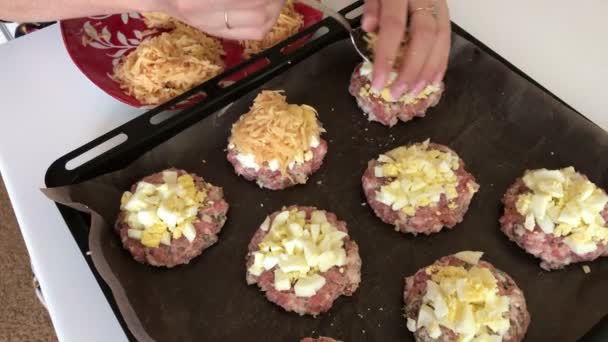 Woman Prepares Food Minced Meat Steaks Potatoes Eggs Cheese Cooking — Stock Video