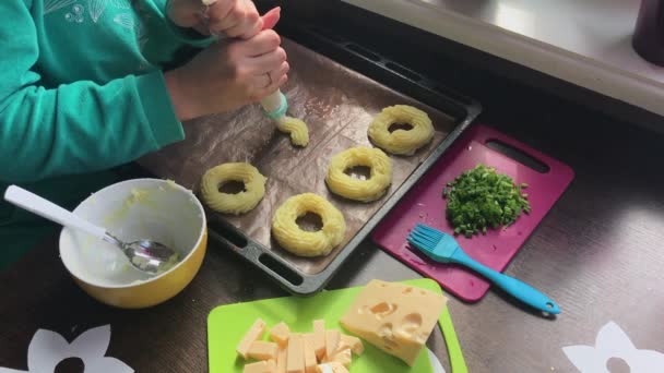 Woman Forms Potato Rings Baking Sheet Help Pastry Bag Cheese — Stock Video