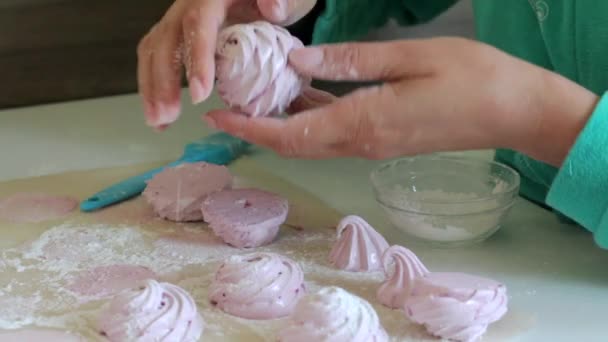 Woman Joins Two Halves Marshmallow Together Sprinkle Powdered Sugar — Stock Video