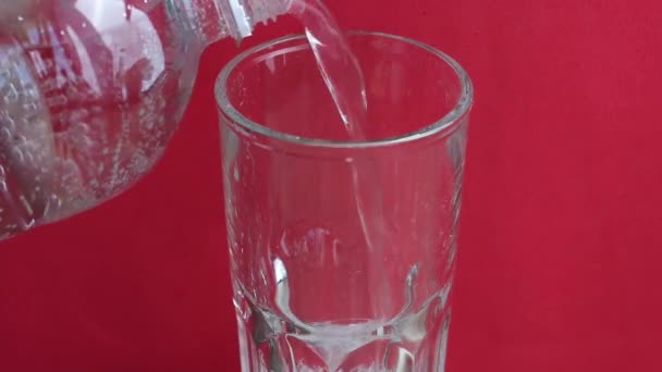 Man Pours Mineral Water Plastic Bottle Glass You Can See — Stock Video