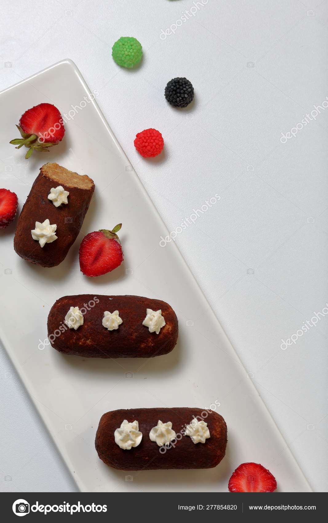 Potato Cake Decorated With Cream Visible Slice Of Cake Nearby
