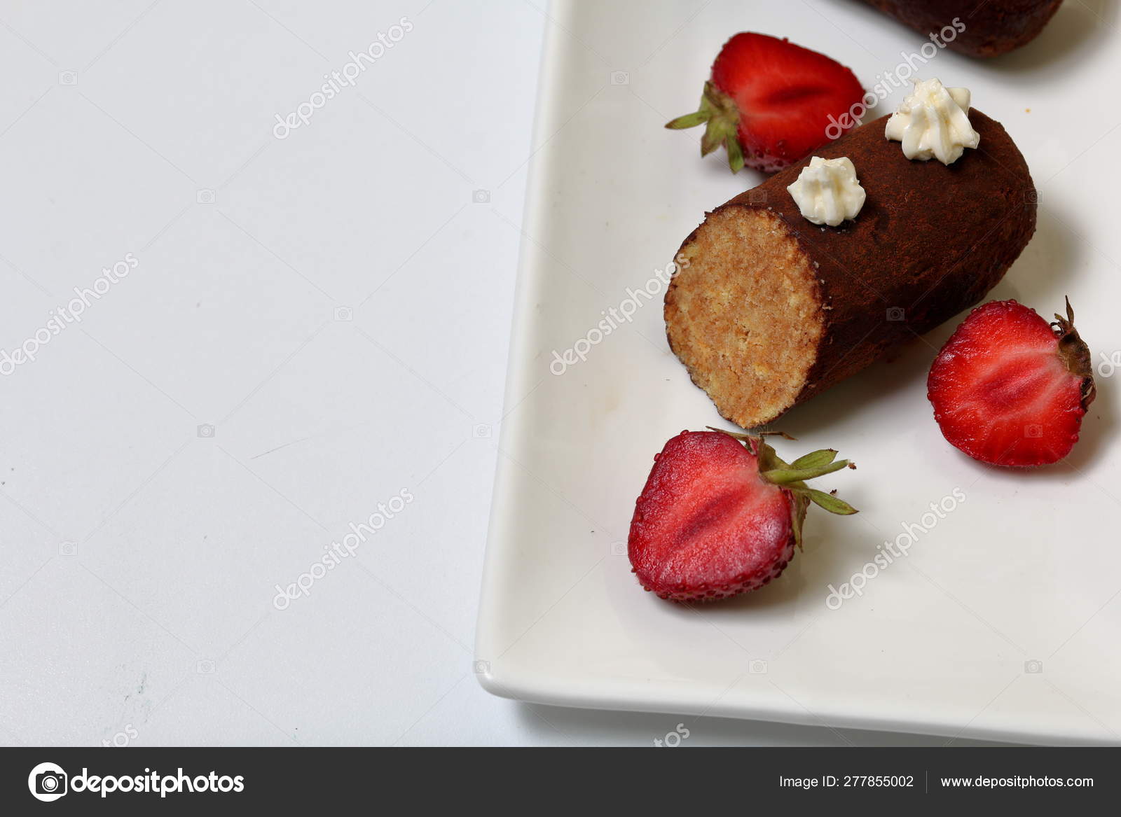 Potato Cake Decorated With Cream Visible Slice Of Cake Nearby