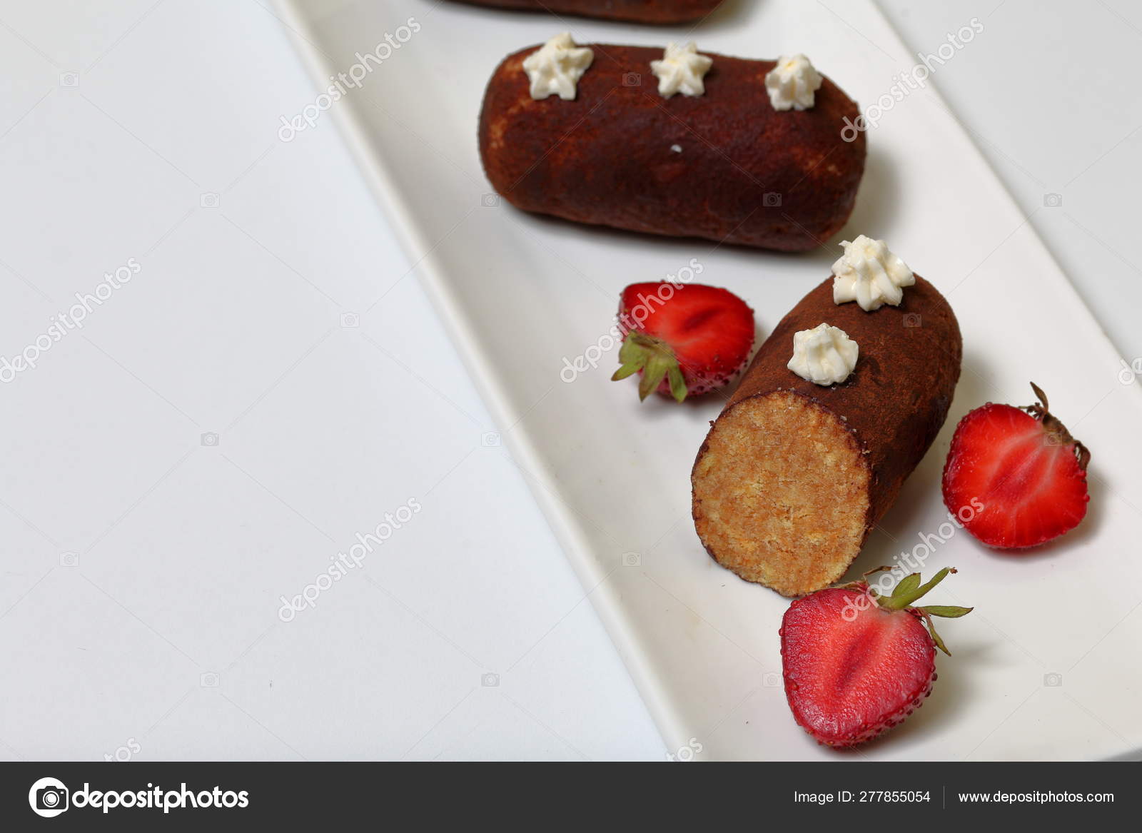Potato Cake Decorated With Cream Visible Slice Of Cake Nearby