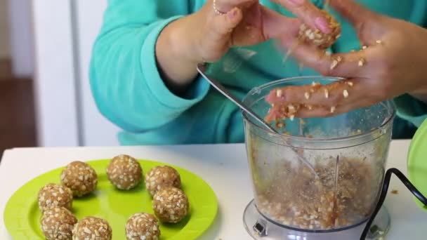 Woman Puts Ball Peanuts Other Ingredients Plate Blank Cake Pops — Stock Video