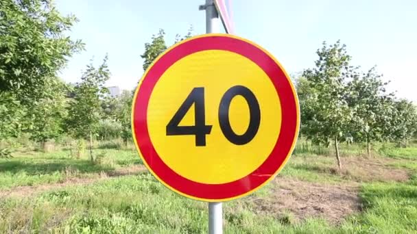 Road Sign Restricting Speed Limit Number Forty Yellow Background Red — Stock Video