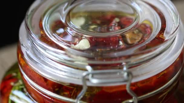 Jar Dried Tomatoes Spices Rosemary Garlic Olive Oil Added Close — Stock Video