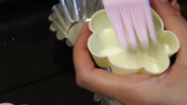 Woman Lubricates Silicone Cake Baking Dishes Uses Pastry Brush Close — Stock Video