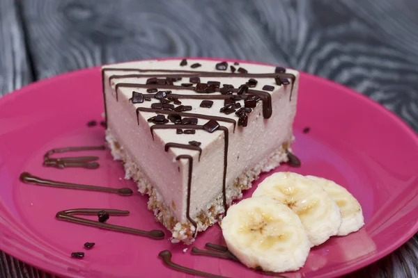 Cheesecake Plate Garnished Bananas Chocolate Brushed Pine Boards Painted Black — Stock Photo, Image