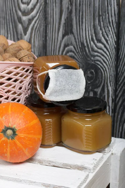 Basket Walnuts Jars Jam Nearby Orange Pumpkin Wearing Medical Mask — Stock Photo, Image