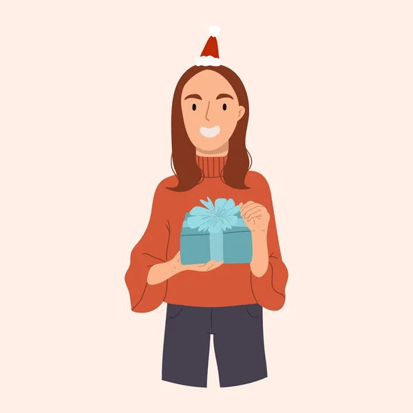 Портрет щасливої усміхненої дівчини, що тримає різдвяний подарунок з капелюхом Санти Клауса . — стоковий вектор