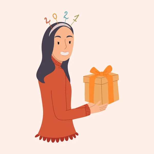 Portrait d'une fille souriante heureuse tenant un cadeau de Noël avec une jante 2021. — Image vectorielle