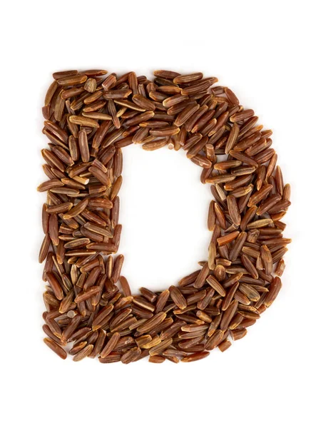 Esmer pirinçten yapılmış İngiliz alfabesinin D harfi izole bir arka planda.. — Stok fotoğraf