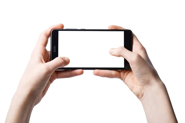 Smartfon w rękach wyizolowany białym tłem z czystym białym ekranem — Zdjęcie stockowe