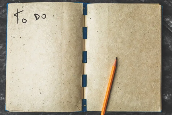 Notebook papier met de textuur en het potlood — Stockfoto