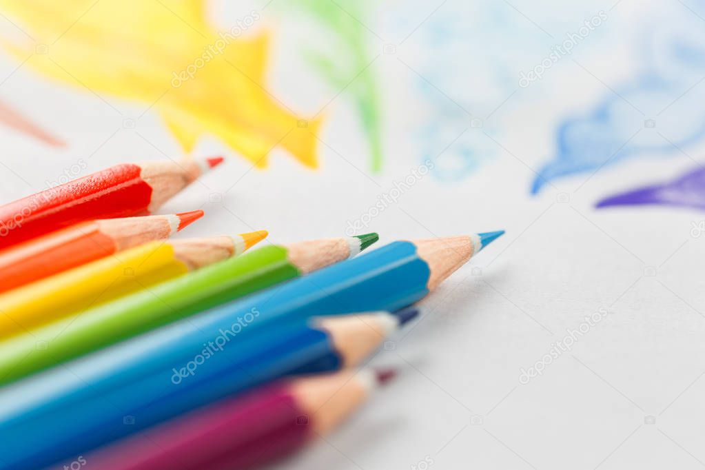 colored pencils on white background close-up in macro