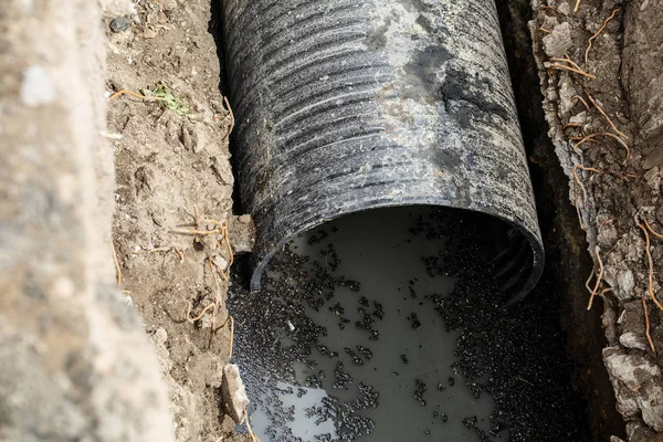 replacement of a sewer pipe deep under the ground