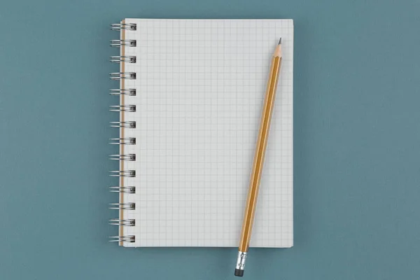 Notebook with pencil on table — Stock Photo, Image