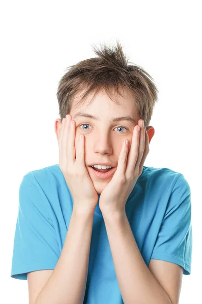 Sorpreso ragazzo tenendo la testa — Foto Stock